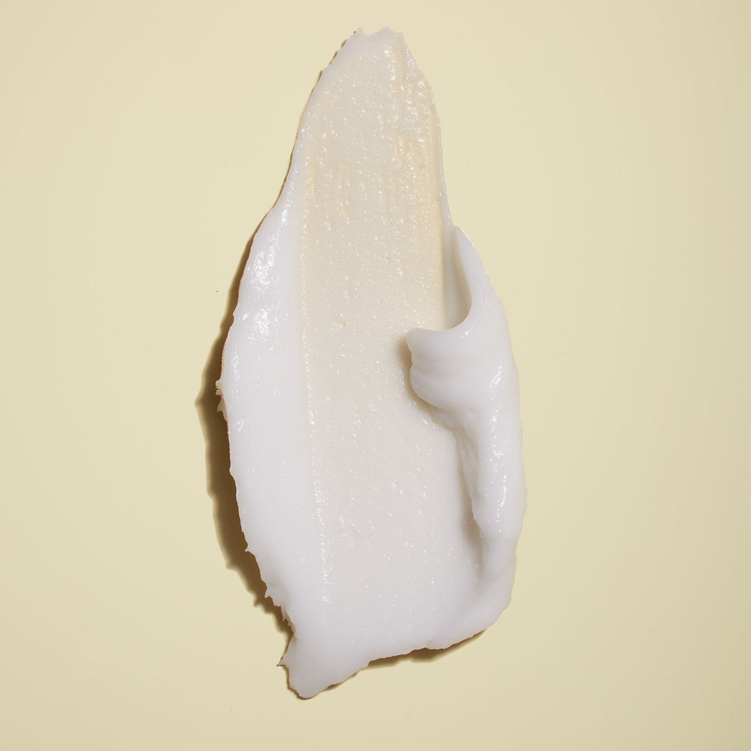 Jackfir Classic Daily Facial Cleanser white creamy texture smear with visible jojoba exfoliating beads