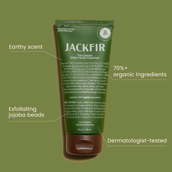 Jackfir Classic Daily Facial Cleanser tube showing earthy scent, exfoliating jojoba beads, and 70% organic ingredients