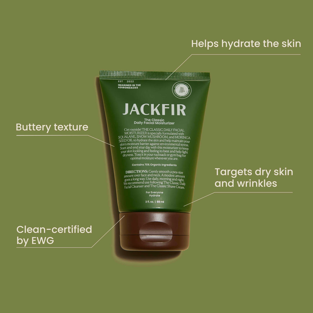 Jackfir Classic Daily Facial Cleanser tube showing earthy scent, exfoliating jojoba beads, and 70% organic ingredients