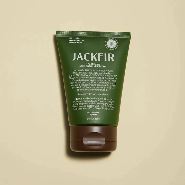 Jackfir Moisturizer + Eye Cream Duo green tube standing upright showing front label with brown flip cap closed
