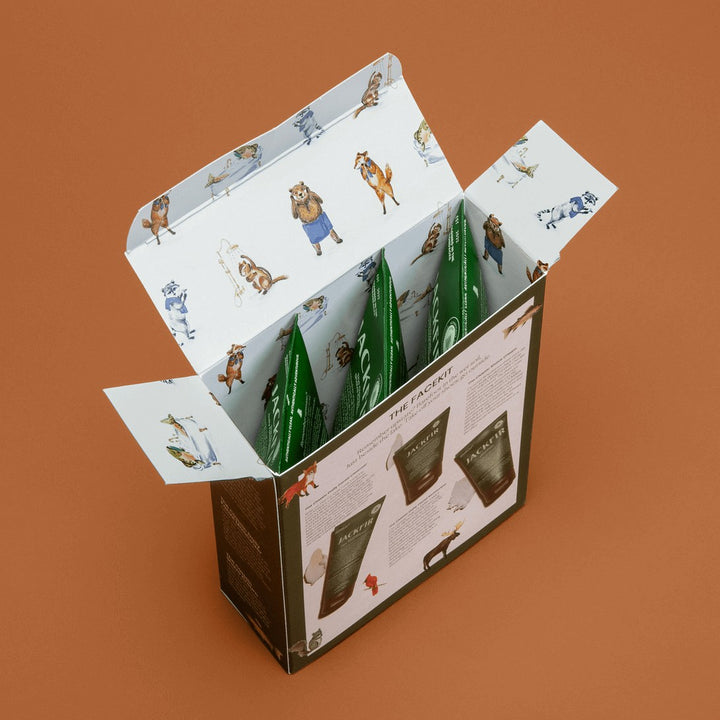 Jackfir The Facekit box open showing three green tubes inside with illustrated animal-patterned lid flaps extended