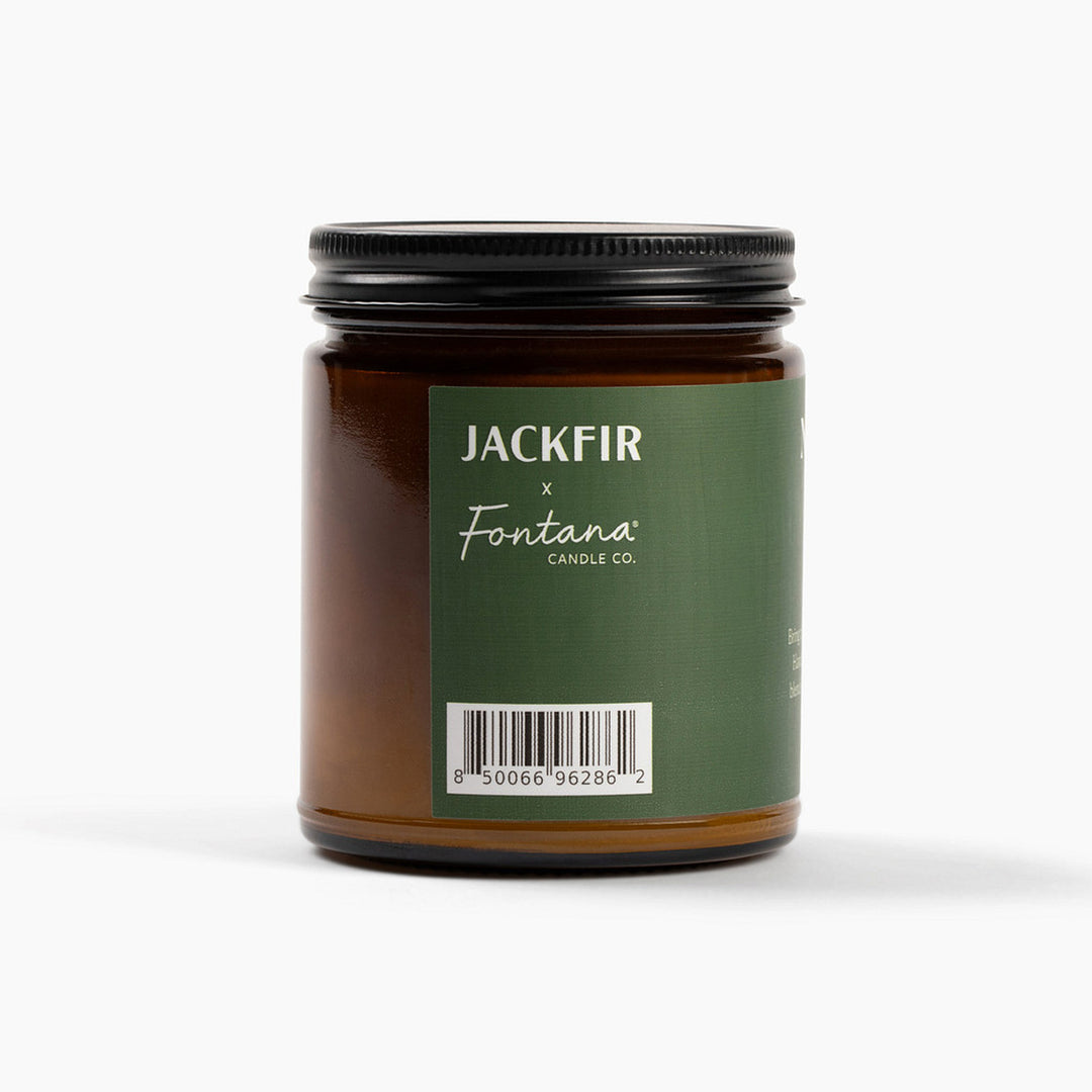 Candle jar labeled 'Jackfir' by Fontana Candle Co. on a white background