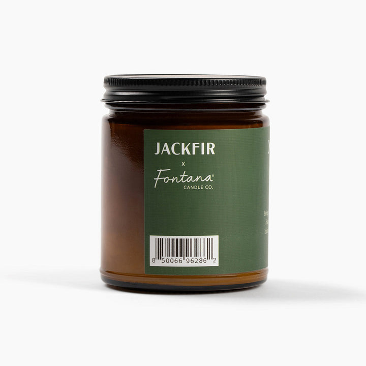 Candle jar labeled 'Jackfir' by Fontana Candle Co. on a white background
